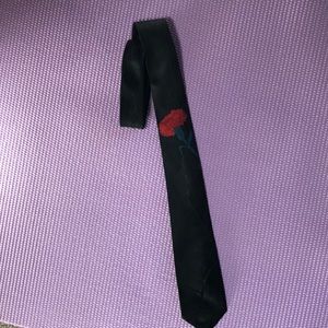 Black Tie with Red Carnation